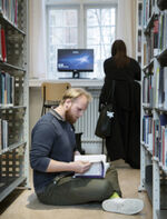 Students reading in the library; photo: Johan Bävman